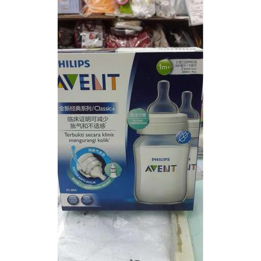 a box of baby food for sale on a shelf.