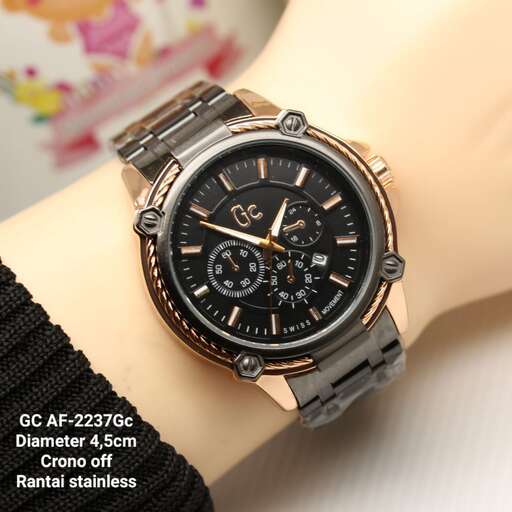 a watch with a black strap