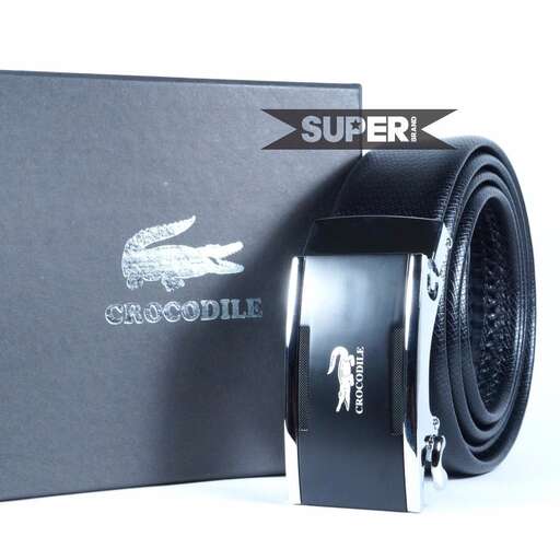 a black and white photo of a watch and a gift box.