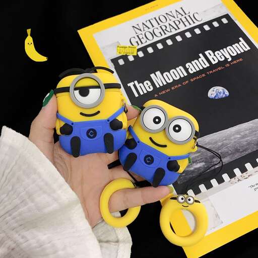 person holds a book with a picture of the moon and stars.