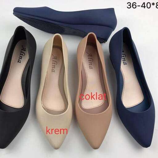 a pair of flat shoes with a shoe on the front.