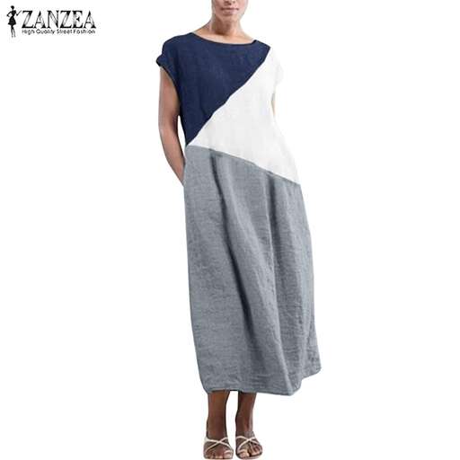 a model in a white and blue dress