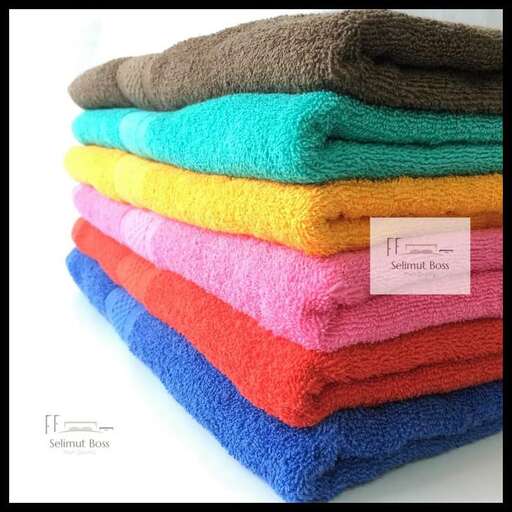 a stack of towels on a white background.