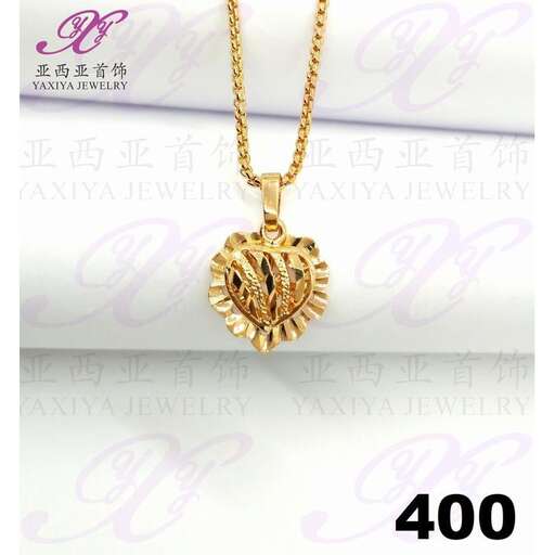 heart of the necklace with a gold heart