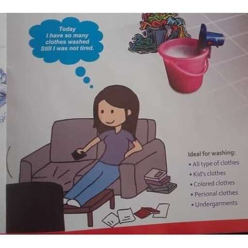 a girl sitting on a couch with a remote in her hand.