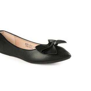 black leather flat shoes with a ribbon around the edges