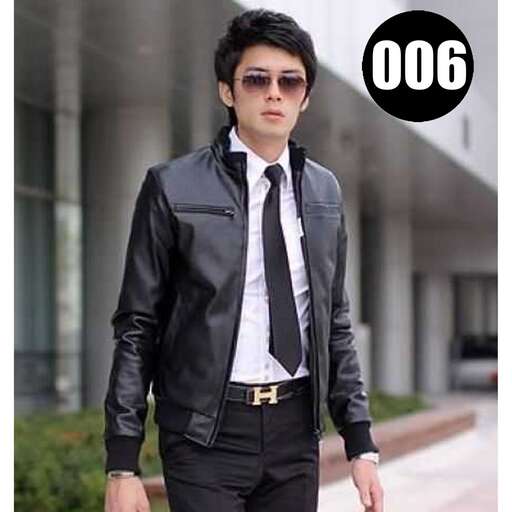 a man in a leather jacket and tie.