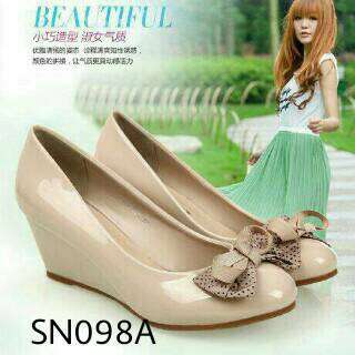 a girl in a green dress