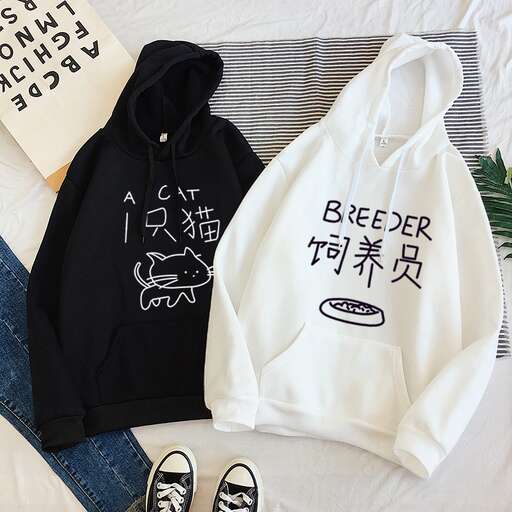 a bag and some shoes are on a bed.