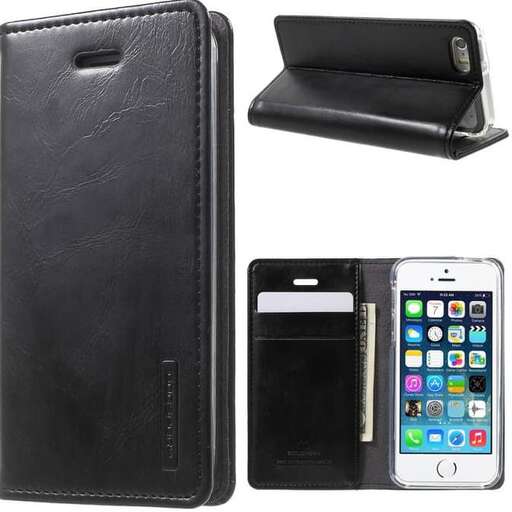 a black case and a white iphone are next to a black case.