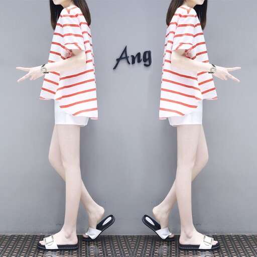 a model in a striped shirt and shorts