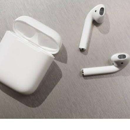 a white plastic container with a handle and a handle.