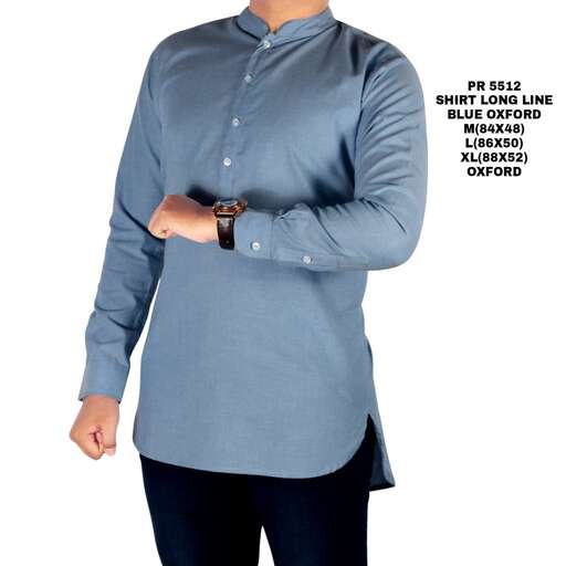 a woman in a light blue shirt