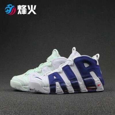 a pair of sneakers that are white and blue.