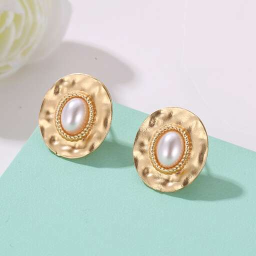 a pair of pearl and pearl earrings