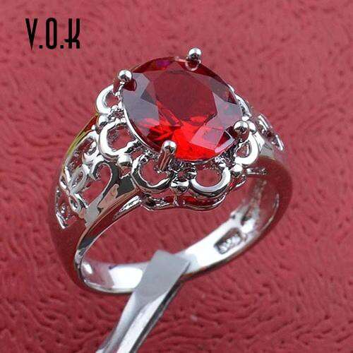 red sapphire set in sterling silver with a red stone.