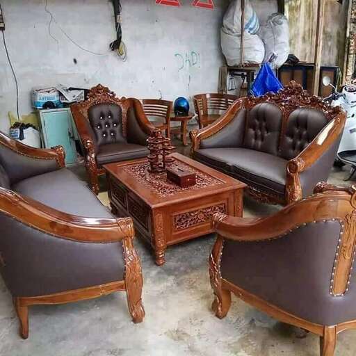 a pair of chairs in a garage.