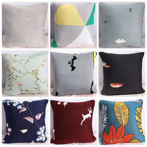 a selection of pillows in blue and green
