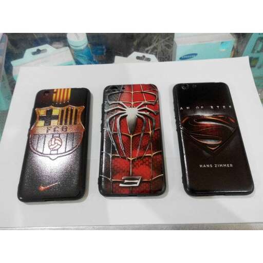 a couple of three cell phones sitting on top of a table.