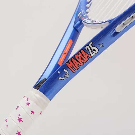 a tennis racket with a bottle of white liquid