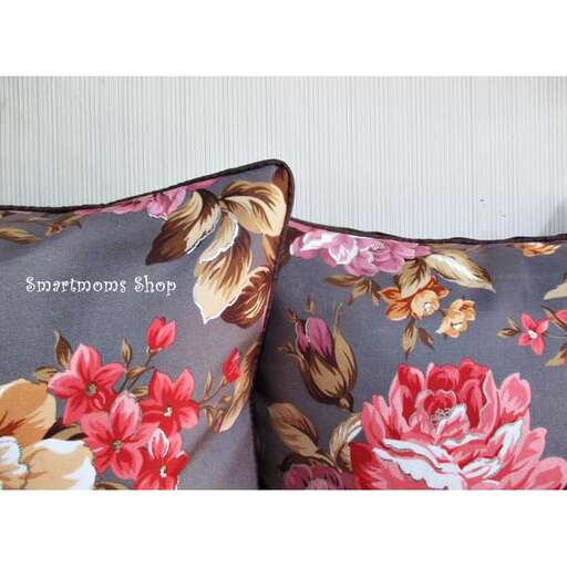 a set of pillows with a floral design.