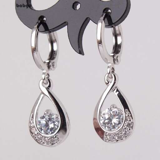 earrings with diamonds in sterling silver and a diamond