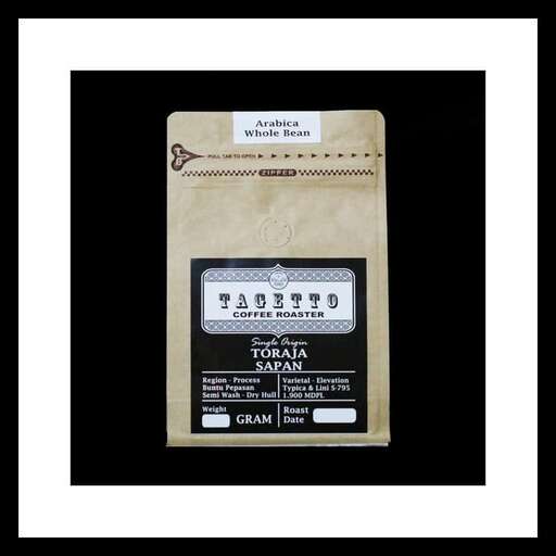 a bag of organic milk in a black background