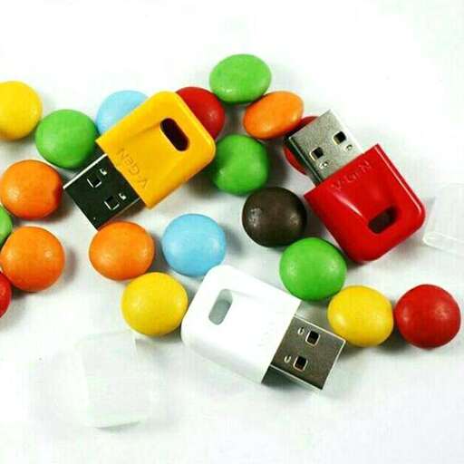 a bunch of colorful candy sitting on top of a table.