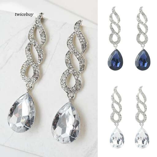 earrings in sterling silver with a blue sapphire and diamond