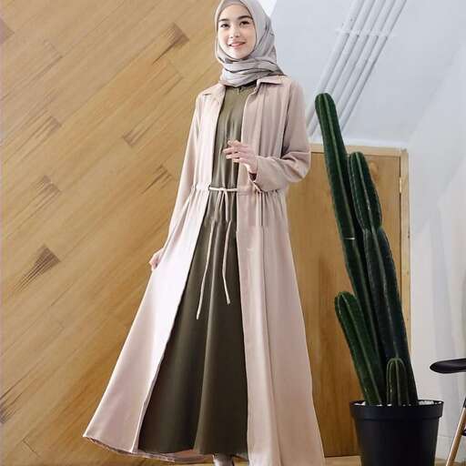 person in a long coat