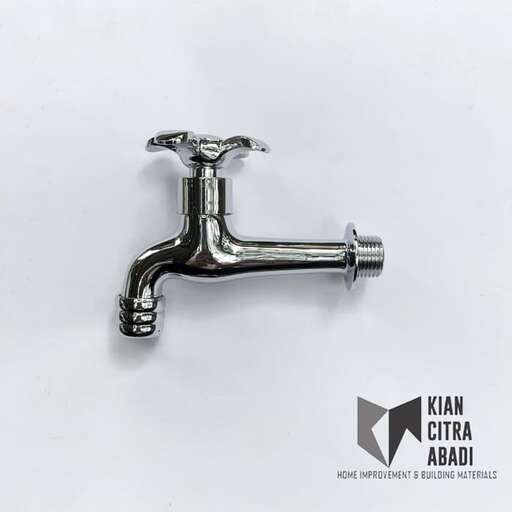 a small faucet in a white background