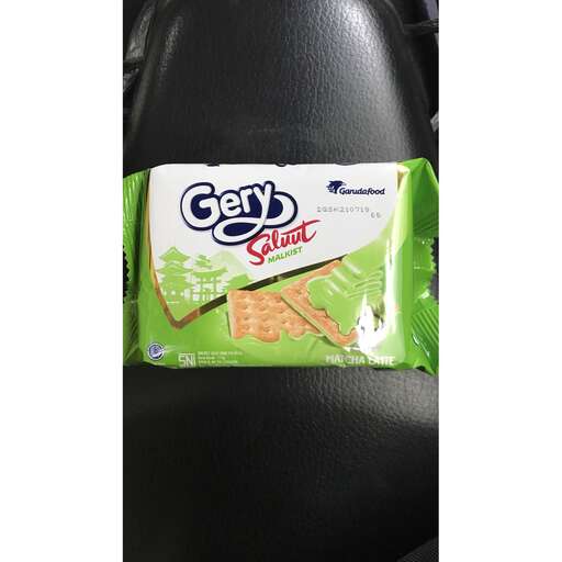 a box of crackers in a car seat.