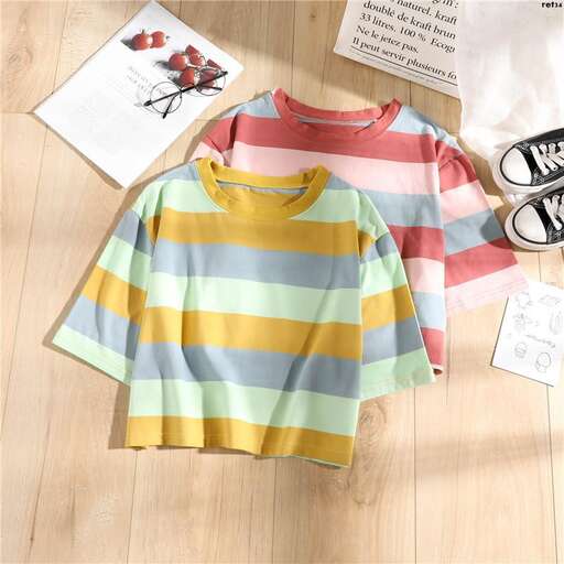 a striped shirt with a lot of buttons in the front.