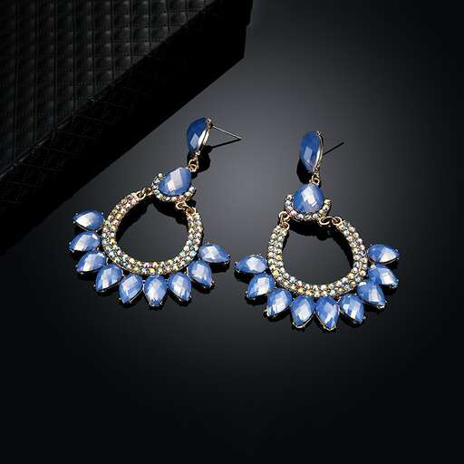 a pair of earrings with a pair of earrings