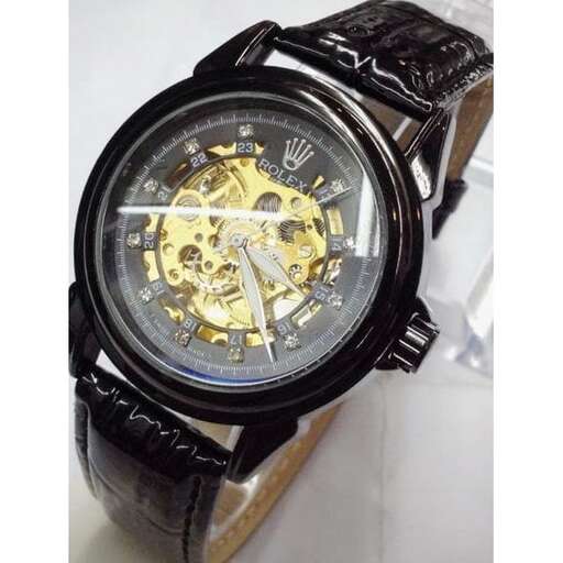 the watch is made of metal and is a very unique watch.