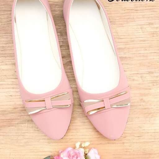 a pair of pink shoes with bow on the toe.