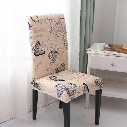 a chair with a floral pattern on it in a bathroom.