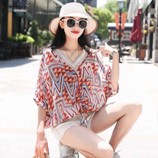 person is wearing a shirt and shorts from person