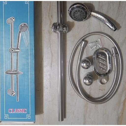 a bathroom sink with a faucet and a shower head.