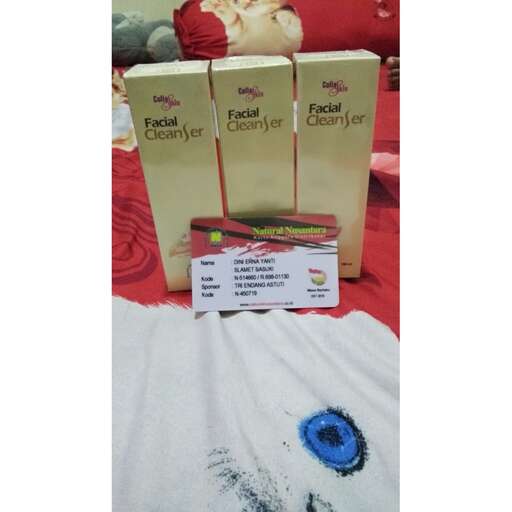 a gift box with a blue flower on it.