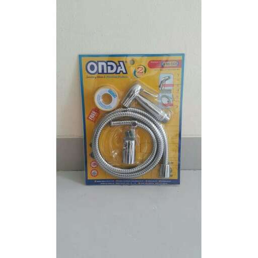 a box of silver, a pair of scissors, and a tube of toothpaste.