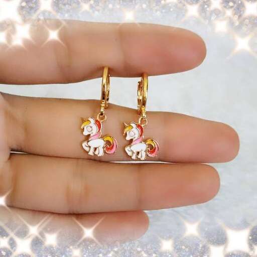 these earrings are made with gold and red glass beads.