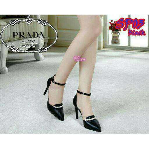 black high heeled shoes with a pink lip