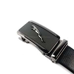 the watch is made of leather and has a metal clasp.