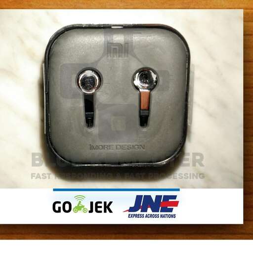 a gray and black electrical outlet with two plugs in the middle.