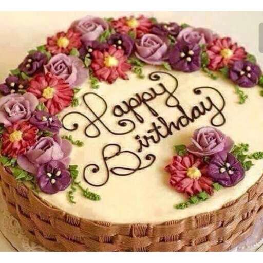 a birthday cake with flowers and a happy birthday.