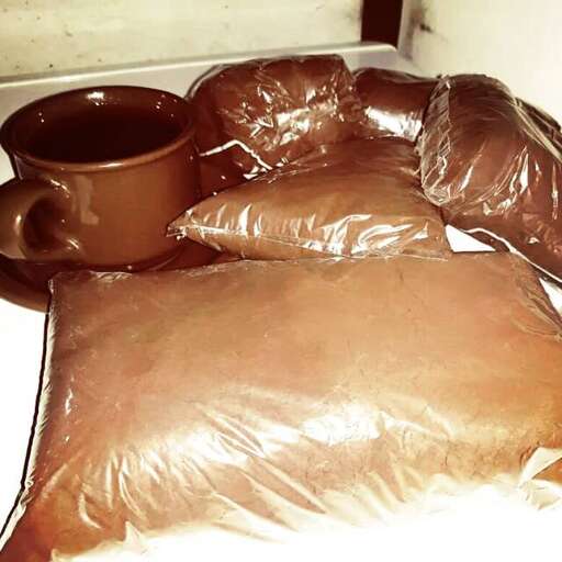 a close up of a bag of coffee and a bag of coffee