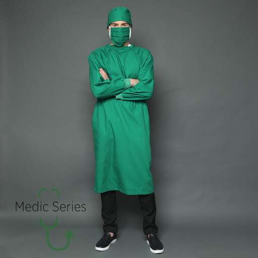 a man in a green costume with a green mask and gloves.