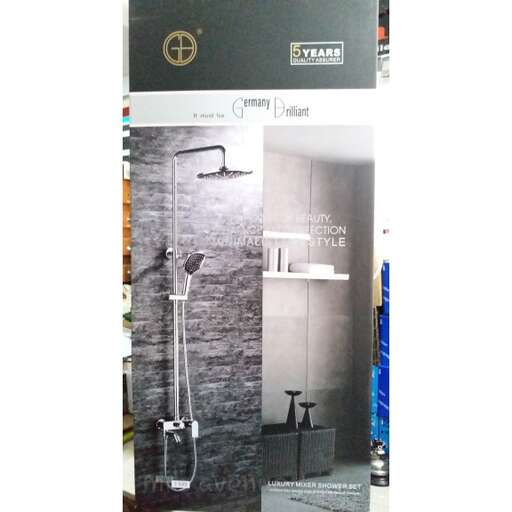 a picture of a bathroom with a sink and a toilet.