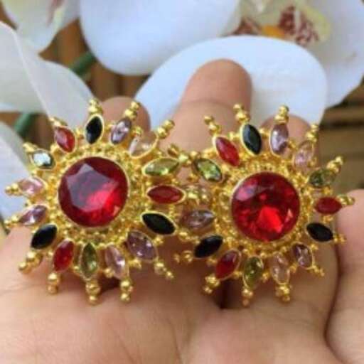 a pair of 18k gold and diamond brooch